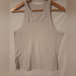 Lululemon top with open back. Grey. Women's size 4